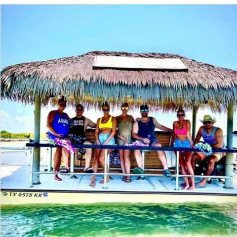 a group of people in a pool of water