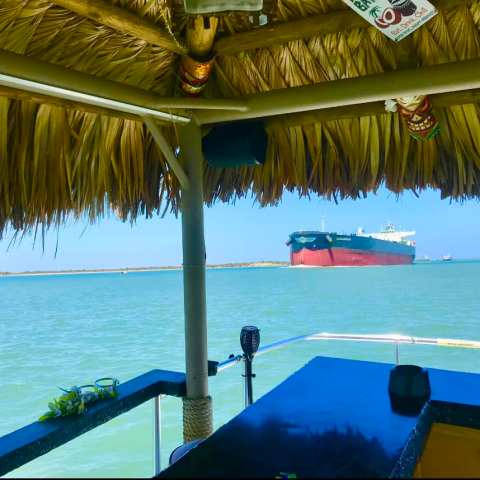 a boat sitting on top of a beach