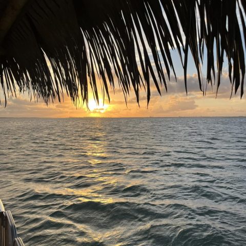 a sunset over a body of water